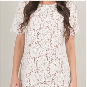 White lace dress. Short wedding dress.